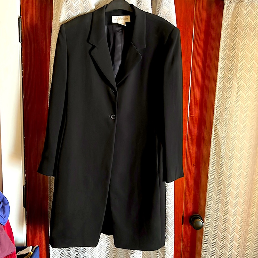 Long black suit jacket. Nice with jeans and dresses. Great condition.